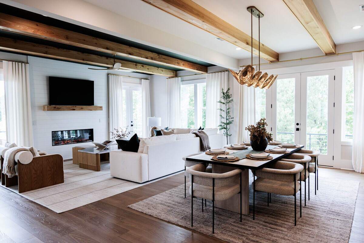 The open concept living room and kitchen of a model home in Lakeside Pointe in Sherrills Ford.