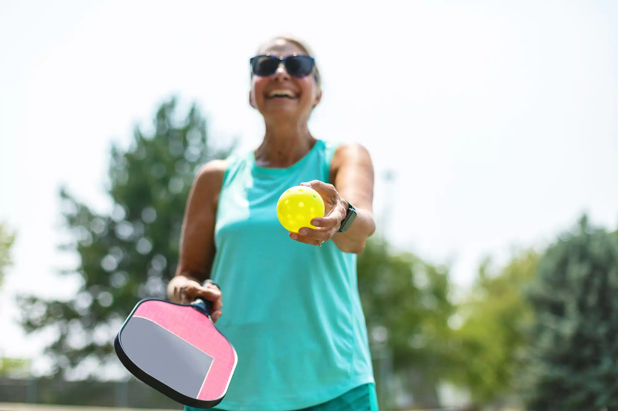 lady with Pickleball racket